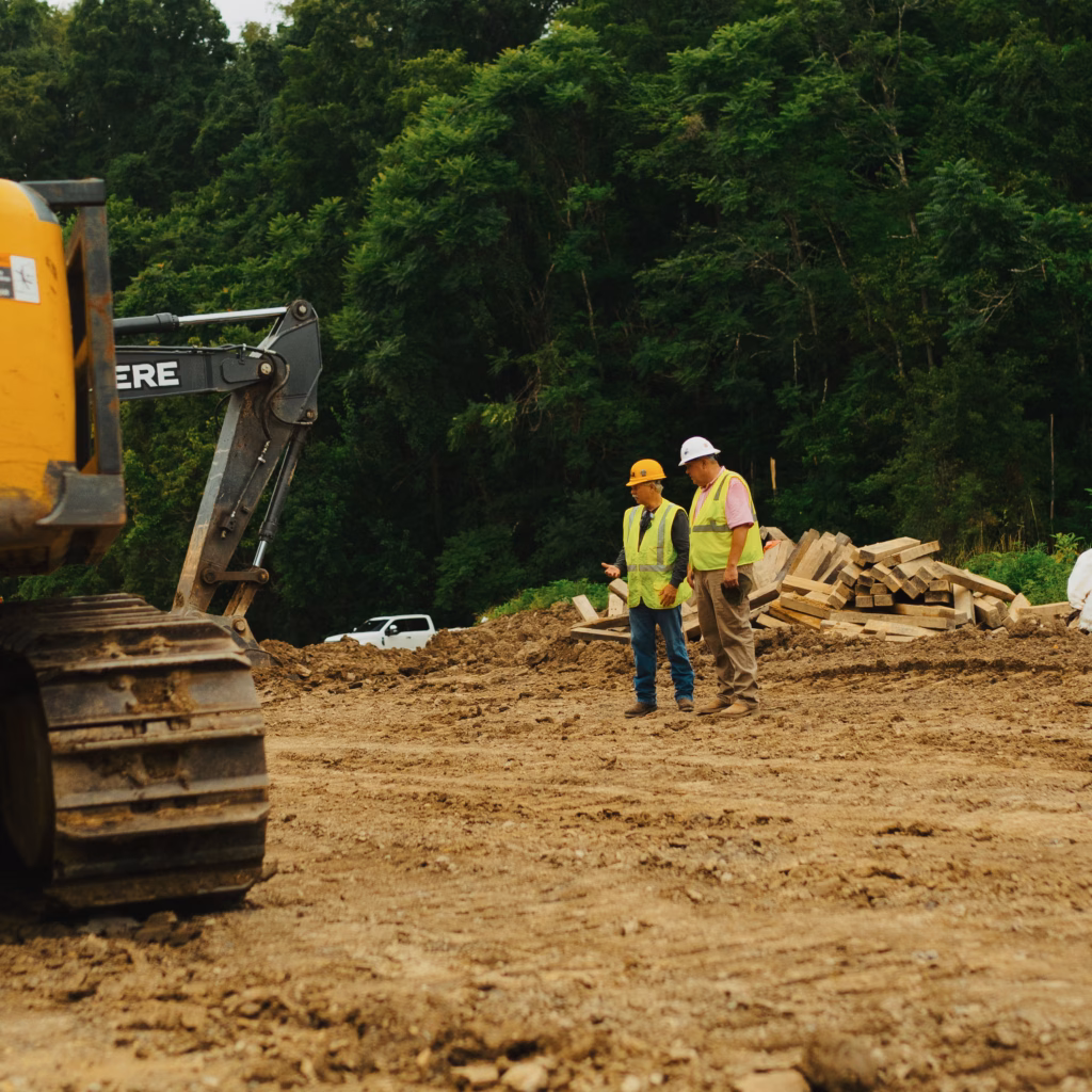 Two people discussing the work being done on the Pipeline project.